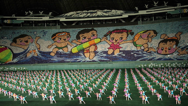 Illustration for article titled The Amazing, Colorful Flip Card Propaganda Mosaics of North Korea
